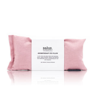 Pink aromatherapy eye pillow with 'salus' branding on a white background