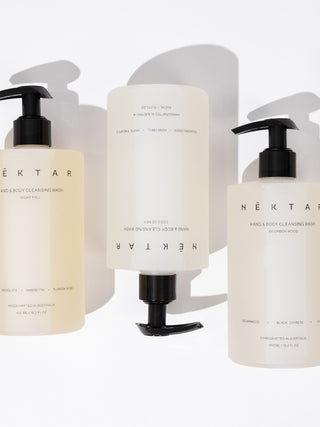 Three bottles of Nektar hand and body cleansing balm on a white background