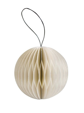 Off white with glitter ornament with a string on a white background