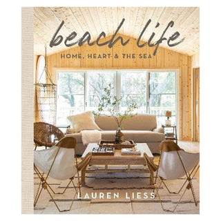 Book cover of 'beach life: Home, Heart & The Sea' by Lauren Lies with a living room scene.