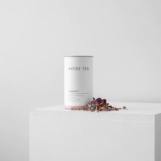 Mayde Tea Serenity canister with dried herbs on a white surface