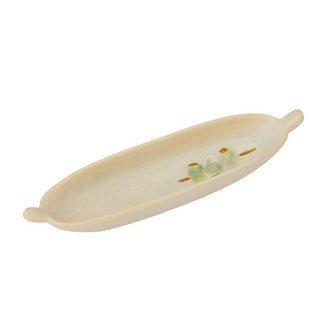 Beige ceramic dish with handles on a white background
