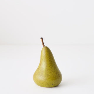Green pear on a white background
