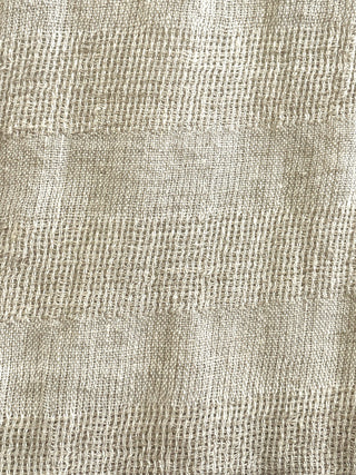 Close-up of textured beige fabric