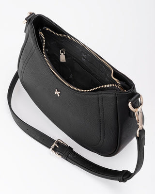 Black handbag with gold accents on a white background