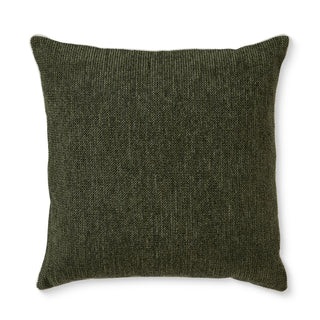 Textured green pillow on a white background