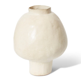 Beige ceramic vase on a white background