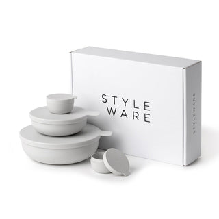 Set of white ceramic bowls with lids next to a 'STYLE WARE' box on a white background