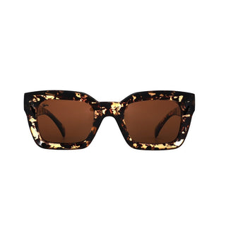 Sunglasses with tortoiseshell frame and brown lenses on a white background