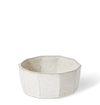 Hexagonal ceramic bowl on a white background
