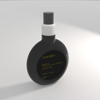 Black and white bottle labeled 'Sonder' on a light gray background