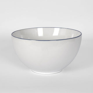 Clear glass bowl with blue rim on a white background
