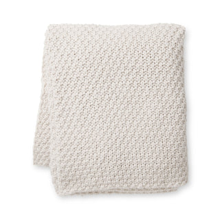 Knitted blanket on a white background