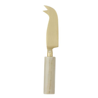 Knife with gold blade and white handle on a white background