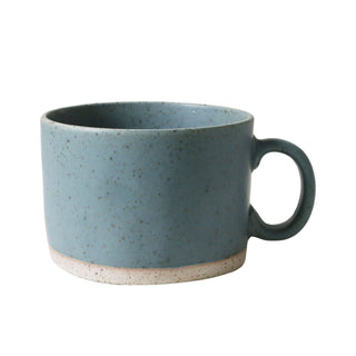 Blue ceramic mug on a white background