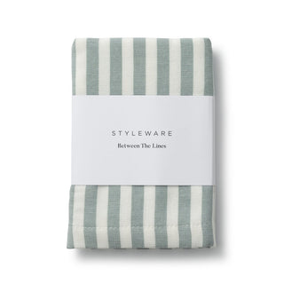 Folded fabric with green and white stripes on a white background, branded 'Styleware'.