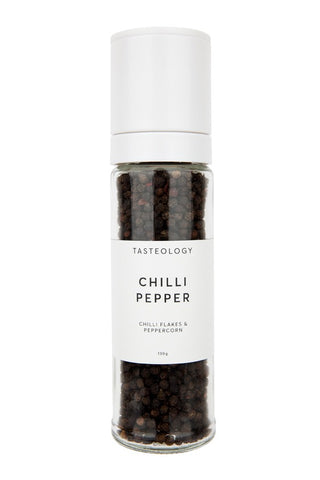 Tasteology chili pepper grinder with white cap and label on a white background