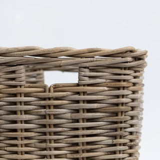 Close-up of a wicker basket with a plain background