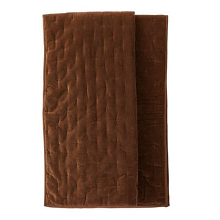 Brown textured blanket on a white background