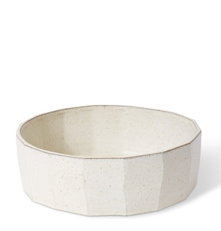 Beige ceramic bowl on a white background