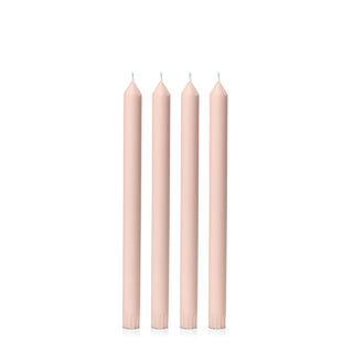 Five pink candles on a white background