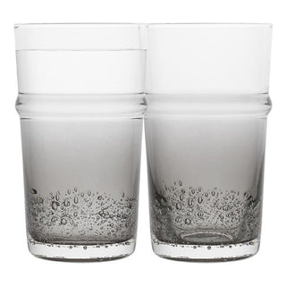 Two clear glass tumblers with bubble texture on a white background