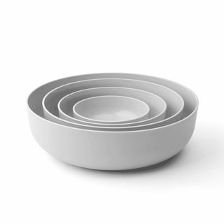 Set of three gray bowls of different sizes on a white background