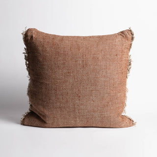 Brown textured pillow on a white background