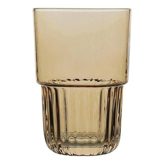Amber glass tumbler with textured base on a white background