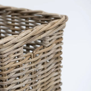 Close-up of a wicker basket on a light gray background