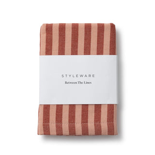 Folded striped fabric with 'Styleware' branding on a white background