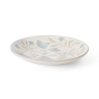 Ceramic plate with floral design on a white background