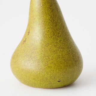 Green pear on a white background