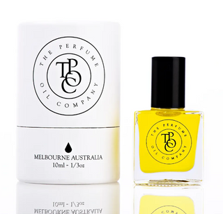 Yellow perfume bottle with black cap and white box labeled 'The Perfume Oil Company' on a white background