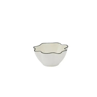White ceramic bowl with black rim on a white background
