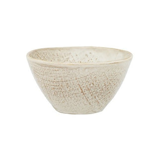 Textured ceramic bowl on a white background