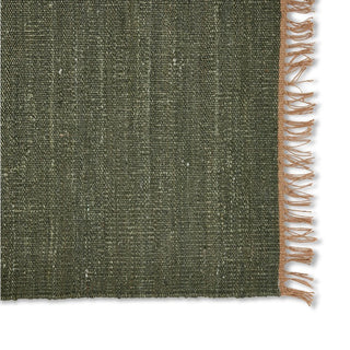 Green textured fabric with a brown fringed edge on a white background
