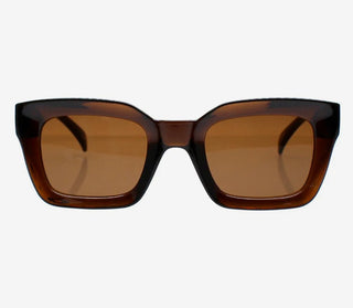 Brown sunglasses with tortoiseshell frame on a white background