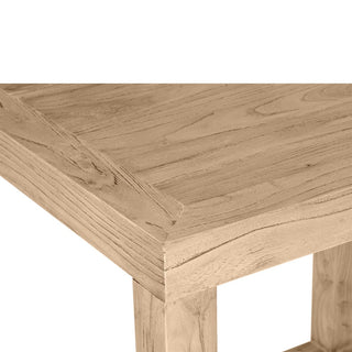 Close-up of a wooden table corner on a white background