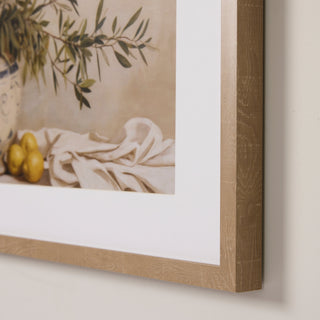 Framed artwork with a natural wood finish on a neutral background