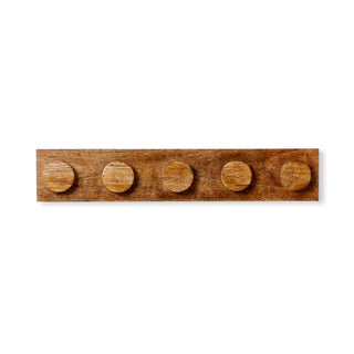 Wooden wall hook with five circular hooks on a white background