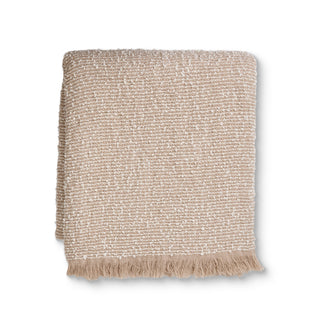 Textured beige blanket with frayed edge on a white background