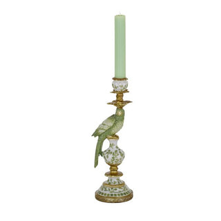 Decorative candle holder with a parrot design on a white background