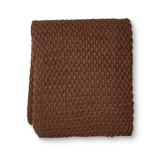 Brown knitted blanket on a white background