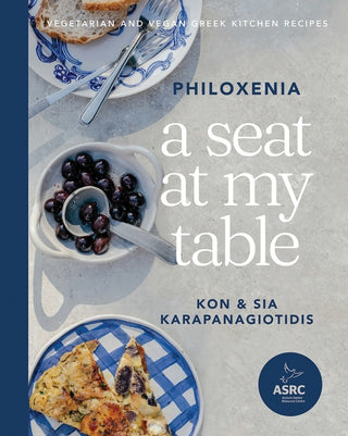 Book cover of 'A Seat at My Table' with images of Greek food and the authors' names.