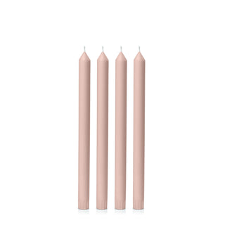Five pink candles on a white background