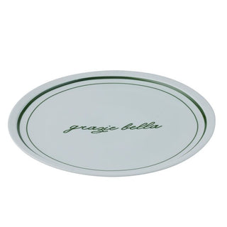 Round white plate with green rim and 'grazie bella' text on a white background