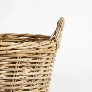 Close-up of a wicker basket on a white background