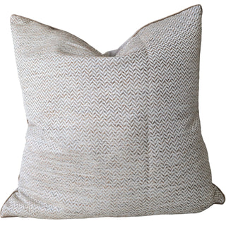 Textured pillow with a herringbone pattern on a white background