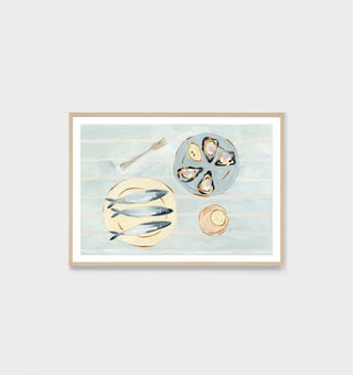 Framed artwork of fish and kitchen utensils on a light blue background